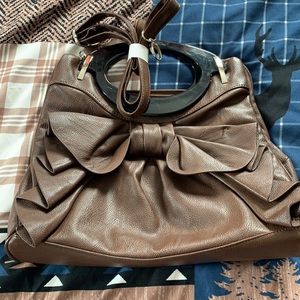 Bow purse brown